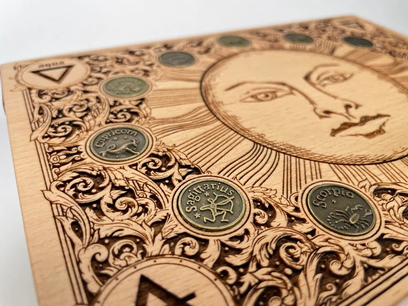 Alchemy symbols box engraved on wood