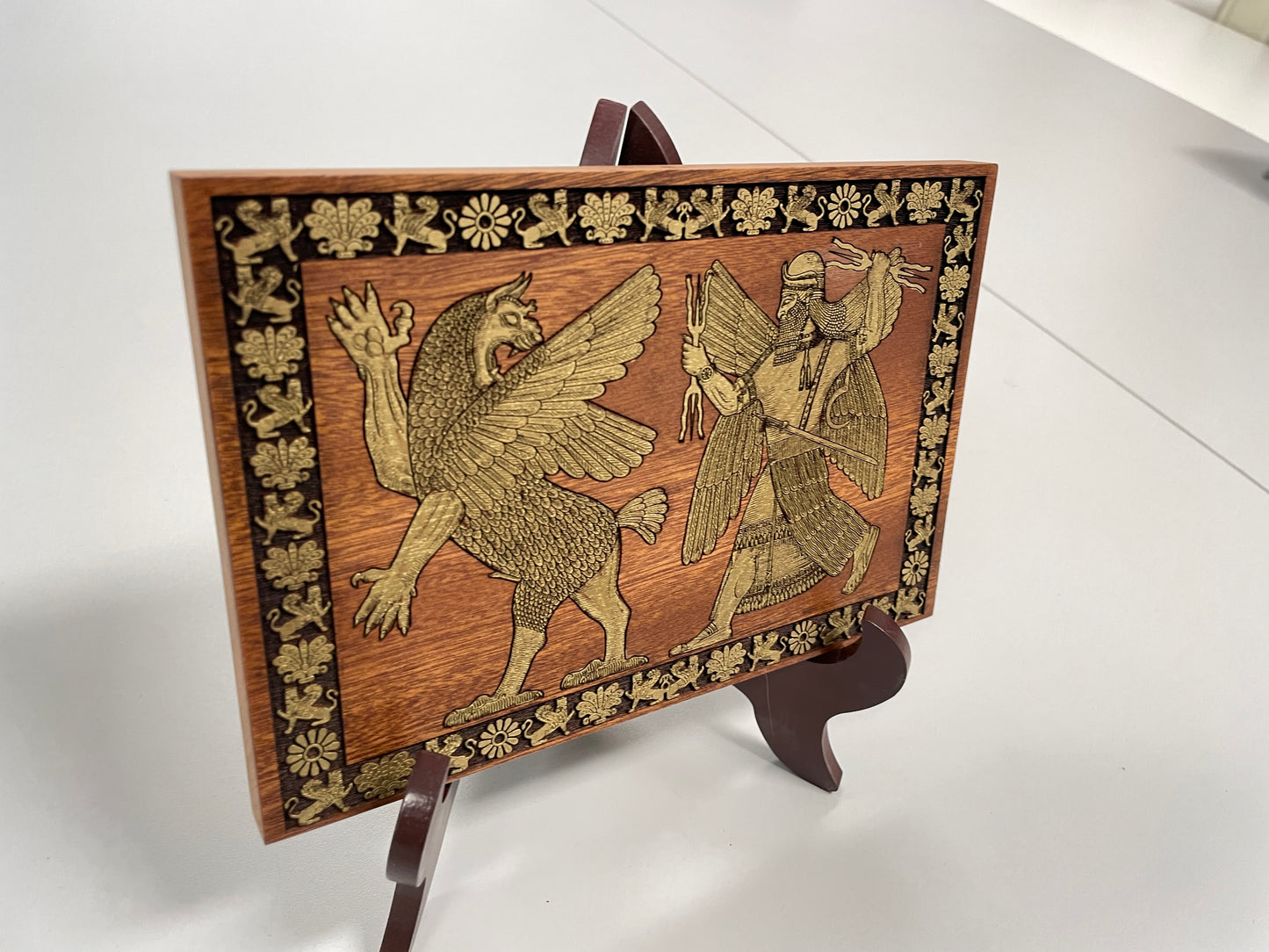 Sumerian Anunnaki god engraved wood wall art panel with ancient Mesopotamian deity motif
