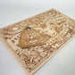 Wooden Ouija board with planchette celestial motifs and letters for intuitive spirit communication

