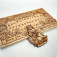 Alice in Wonderland Ouija board engraved on wood with whimsical Wonderland characters and symbols handmade Netherlands ships to USA
