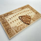 Medieval woodcut Ouija board engraved wood with planchette inspired by Holbein’s Dance of Death
