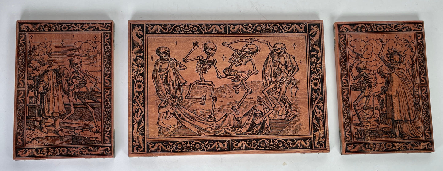 Danse Macabre mahogany wall art triptych engraved with medieval Dance of Death scenes
