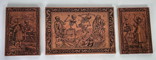Danse Macabre mahogany wall art triptych engraved with medieval Dance of Death scenes
