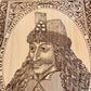 Close up of detailed engraving of Vlad the Impaler portrait on beech wood wall art gift idea 