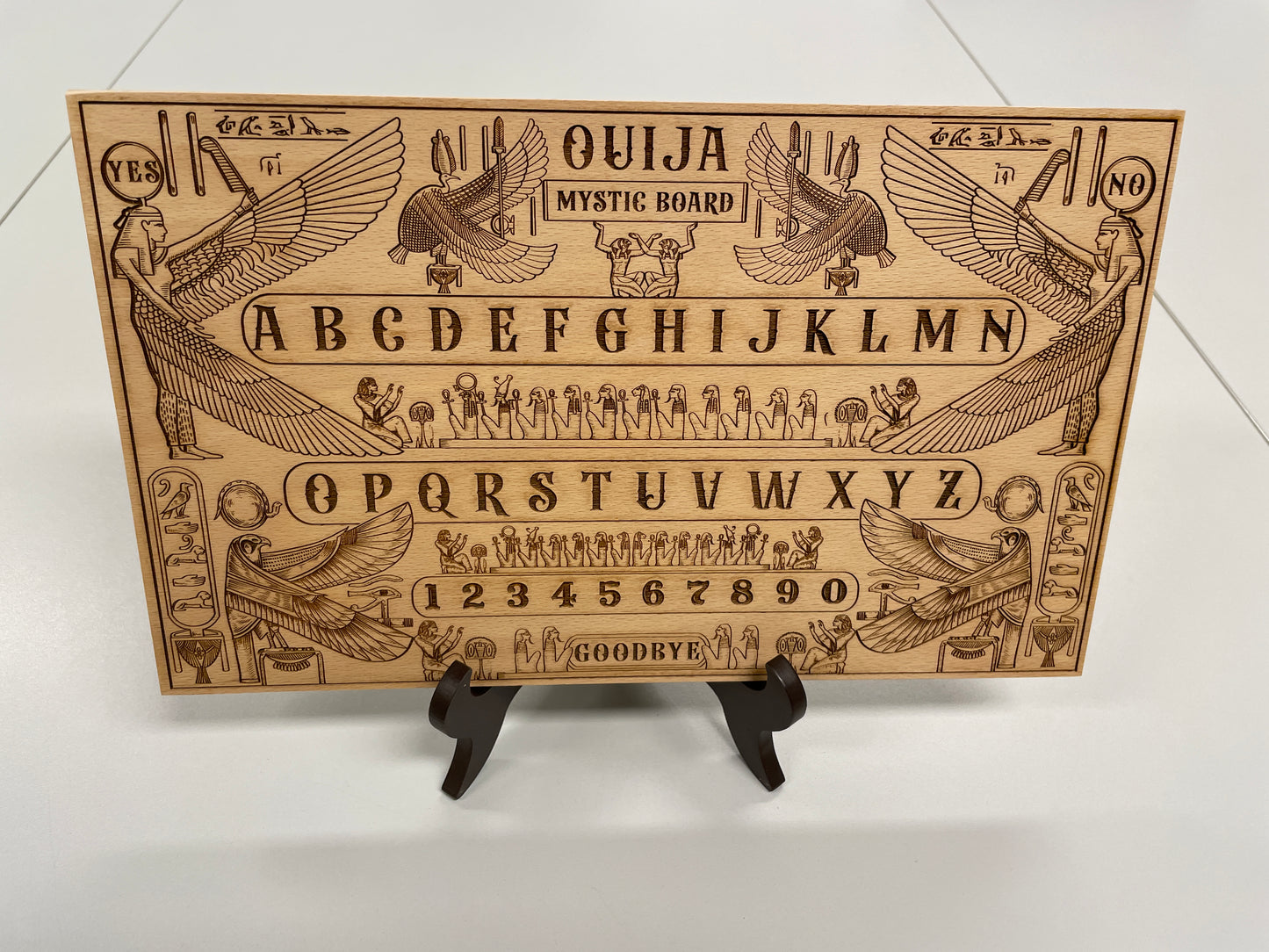 Egyptian wooden Ouija board engraved with Anubis and Thoth Book of the Dead spirit board
