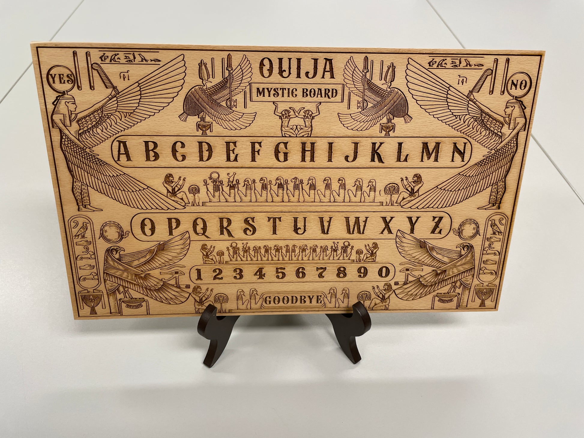 Egyptian wooden Ouija board engraved with Anubis and Thoth Book of the Dead spirit board
