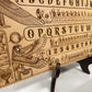 Close up engraving of Egyptian mythology spirit board with planchette on wood
