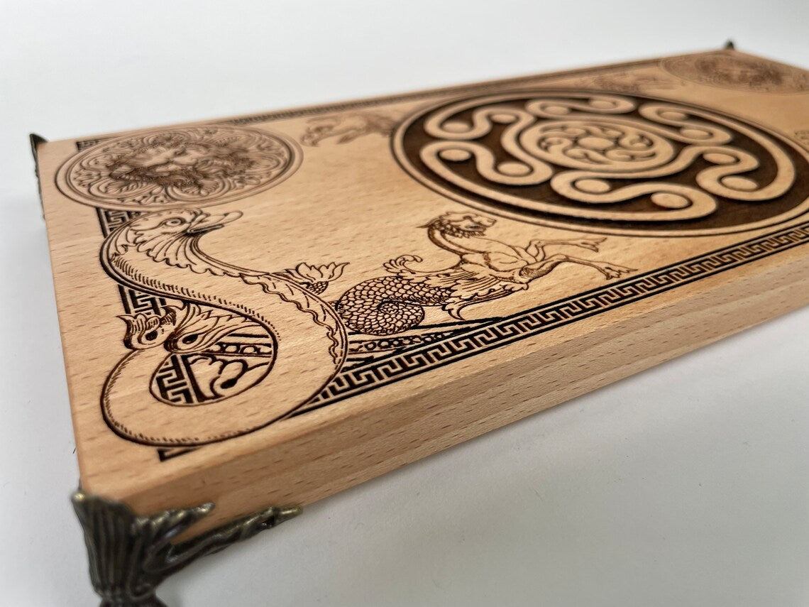Close up of Hecate sigil engraved on wooden altar table for ritual practice
