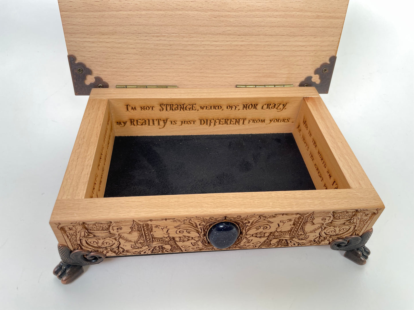 Interior of Alice in Wonderland keepsake box with velvet lining for tarot or jewelry
