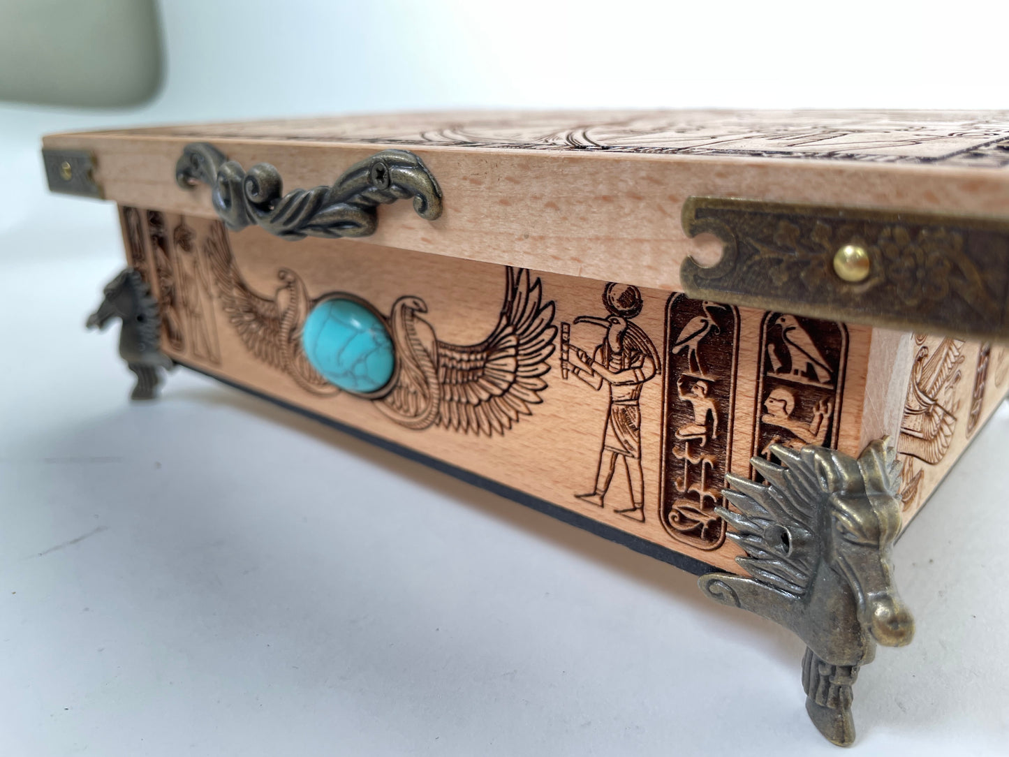 Close up of Egyptian hieroglyph engraving on altar table surface
