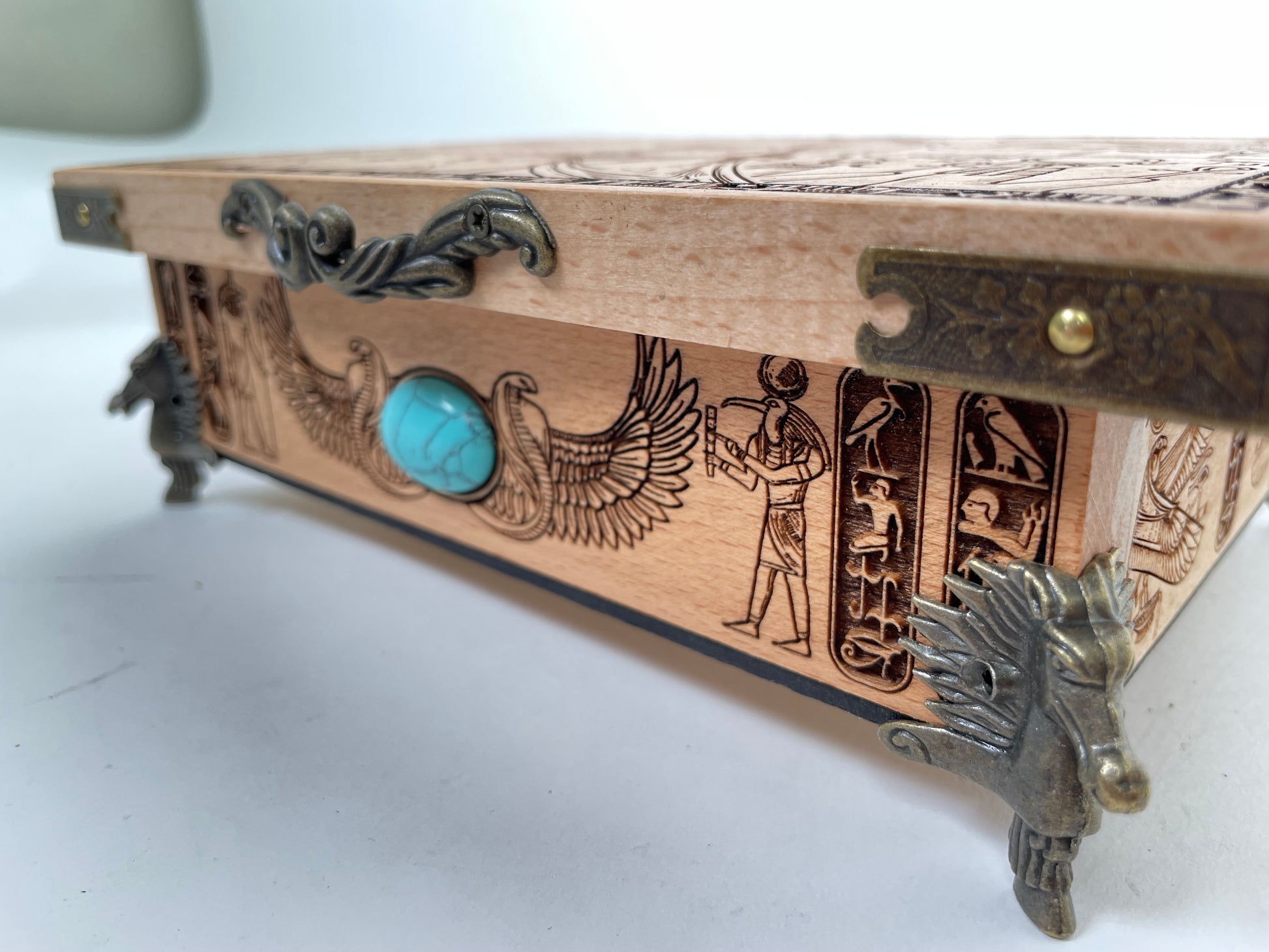 Close up of Egyptian hieroglyph engraving on altar table surface
