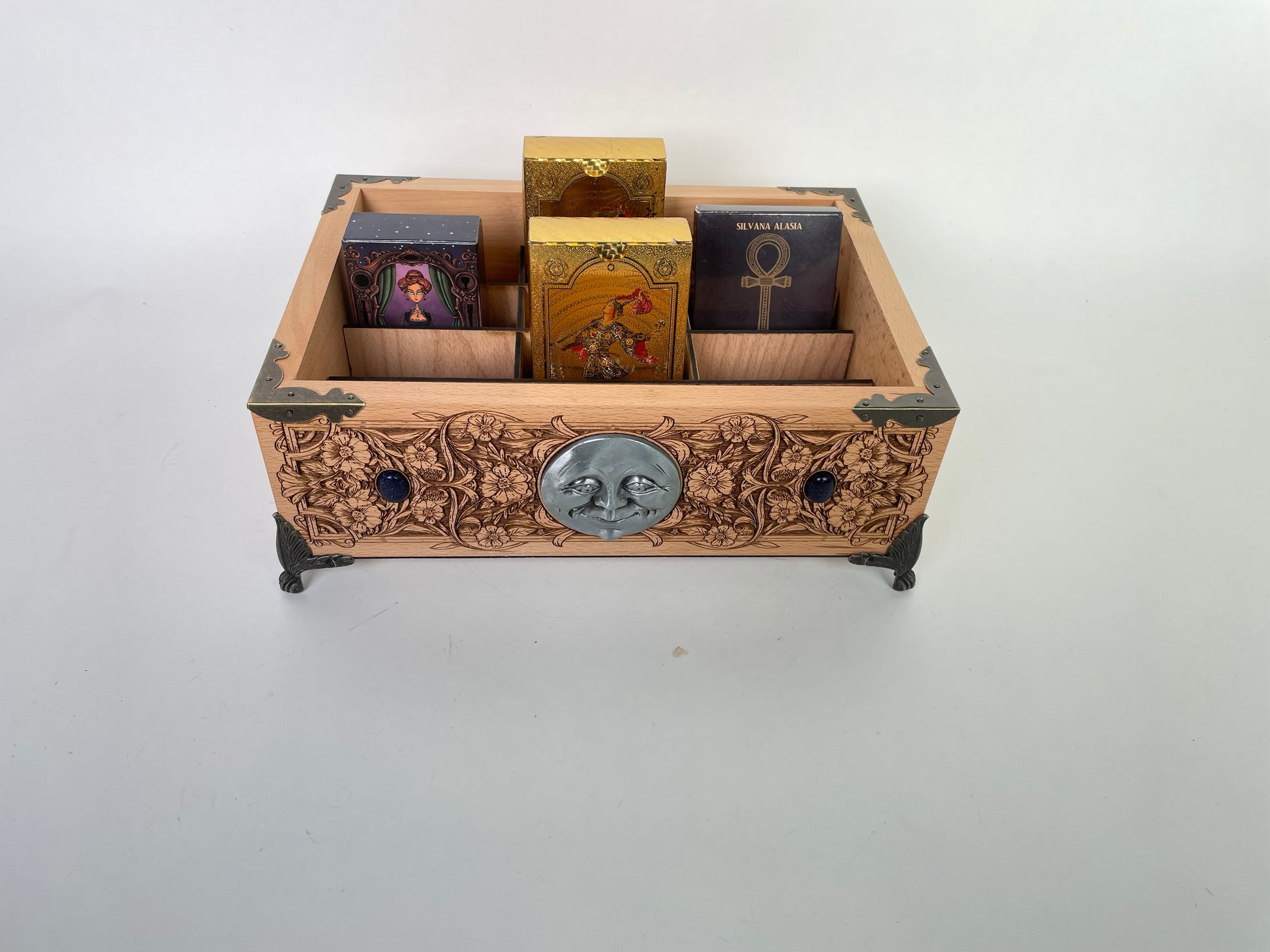 Multiple deck storage box used as altar decor for tarot and oracle cards
