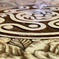Close-up of Hekate sigil on wood surface.
