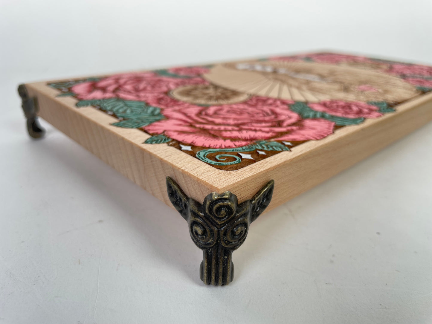 Wooden altar board for tarot crystals incense and candles in cultural sacred space
