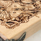 Close up of Celtic pentagram engraving on beech wood  ritual altar table
