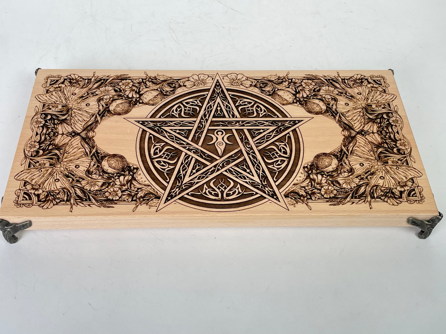 Wiccan Pagan altar table displayed with sacred tools and ritual decor
