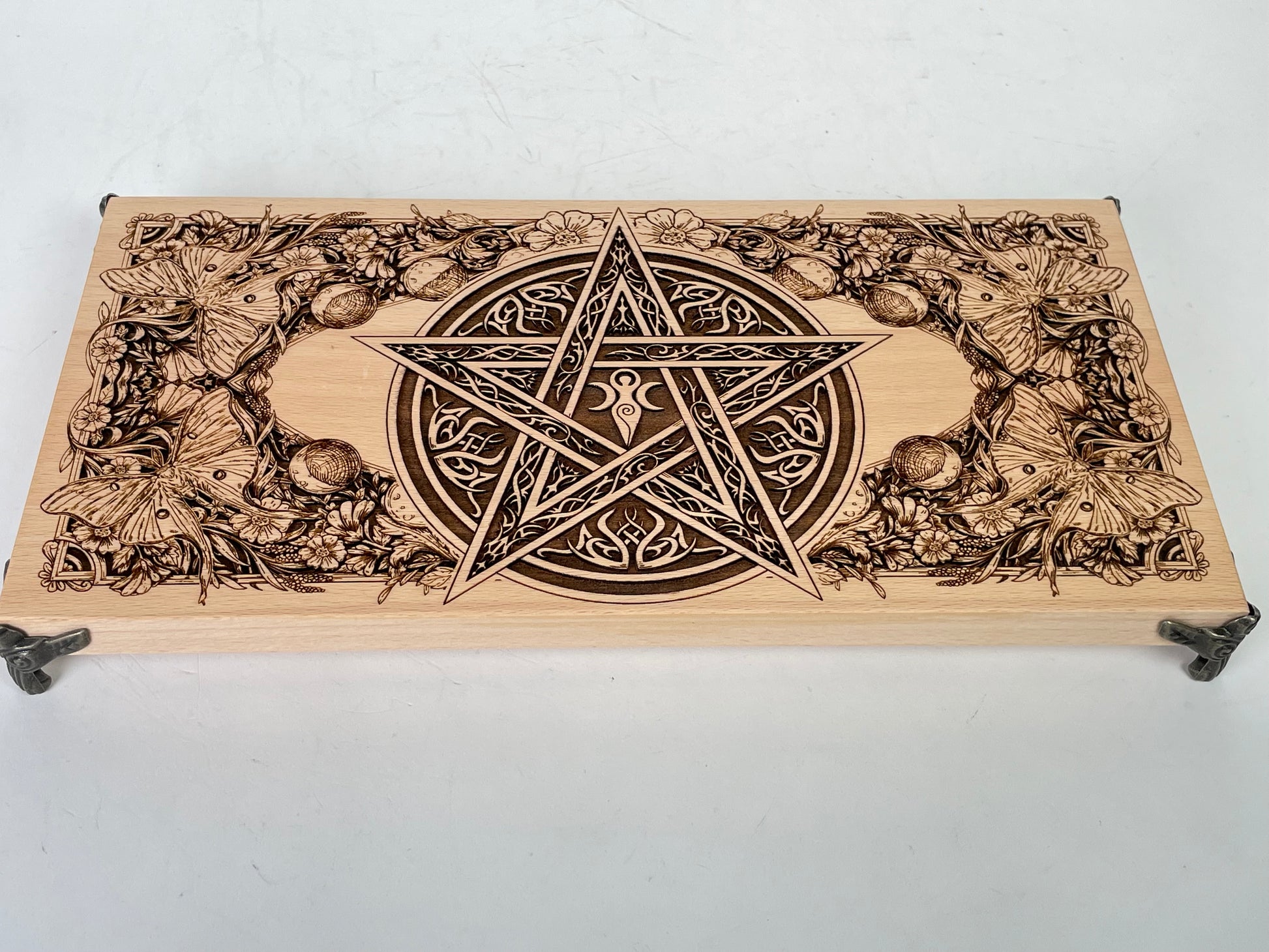 Wiccan Pagan altar table displayed with sacred tools and ritual decor
