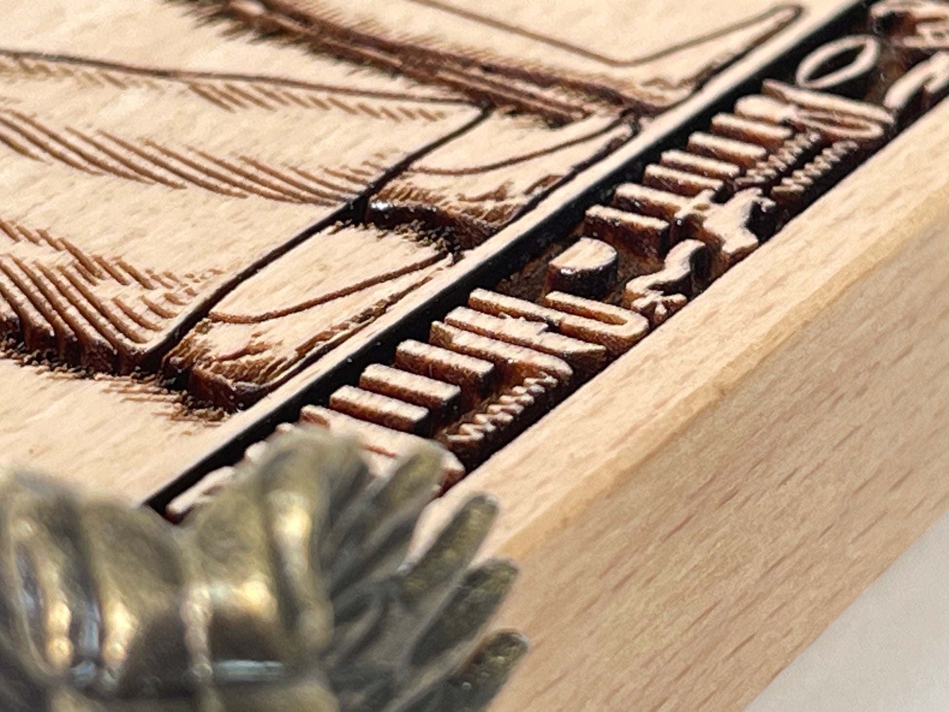 Side view of engraved Egyptian altar table showing natural wood grain
