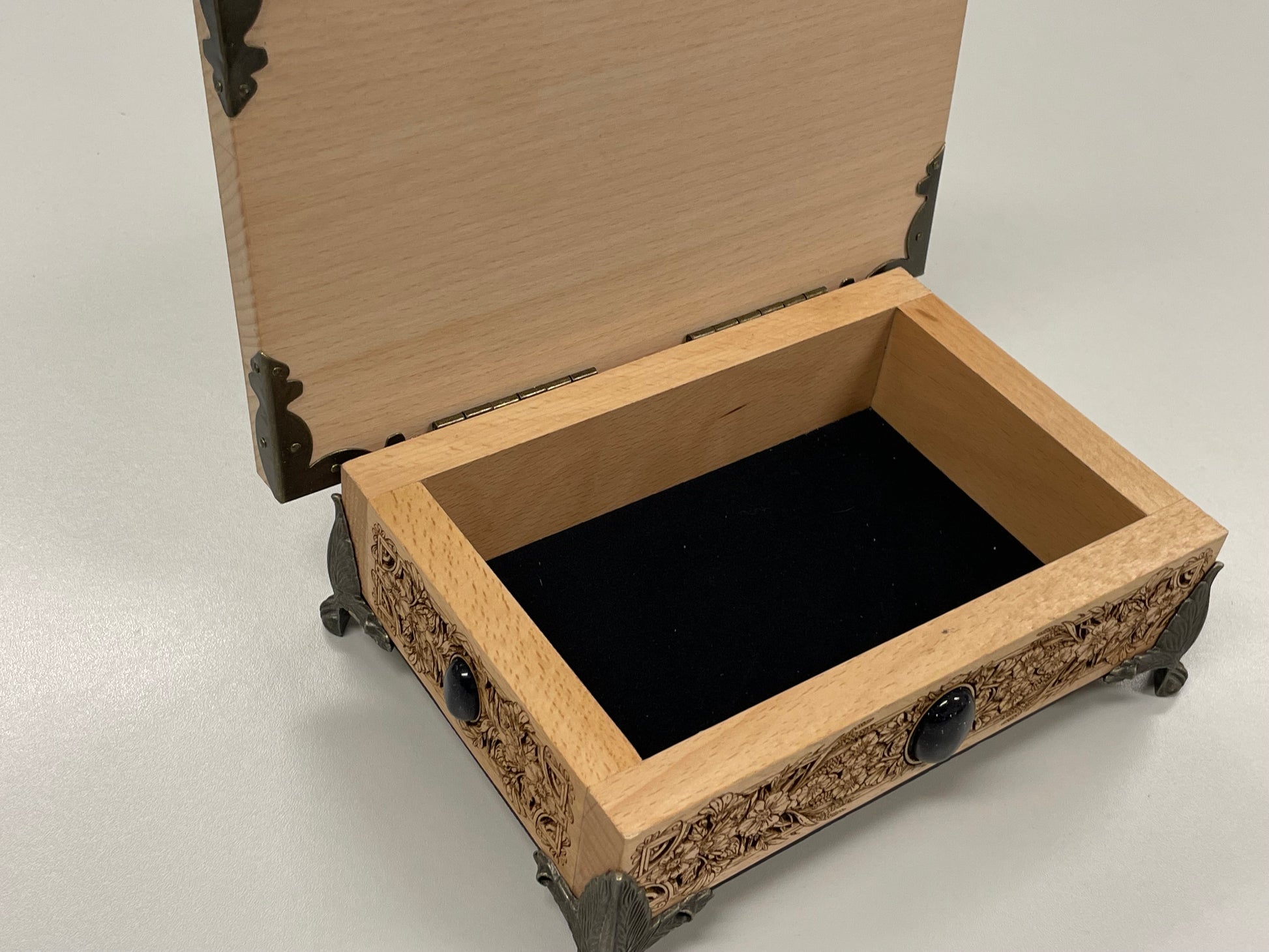 Interior of wooden moth  tarot deck holder with space for crystals and jewelry 