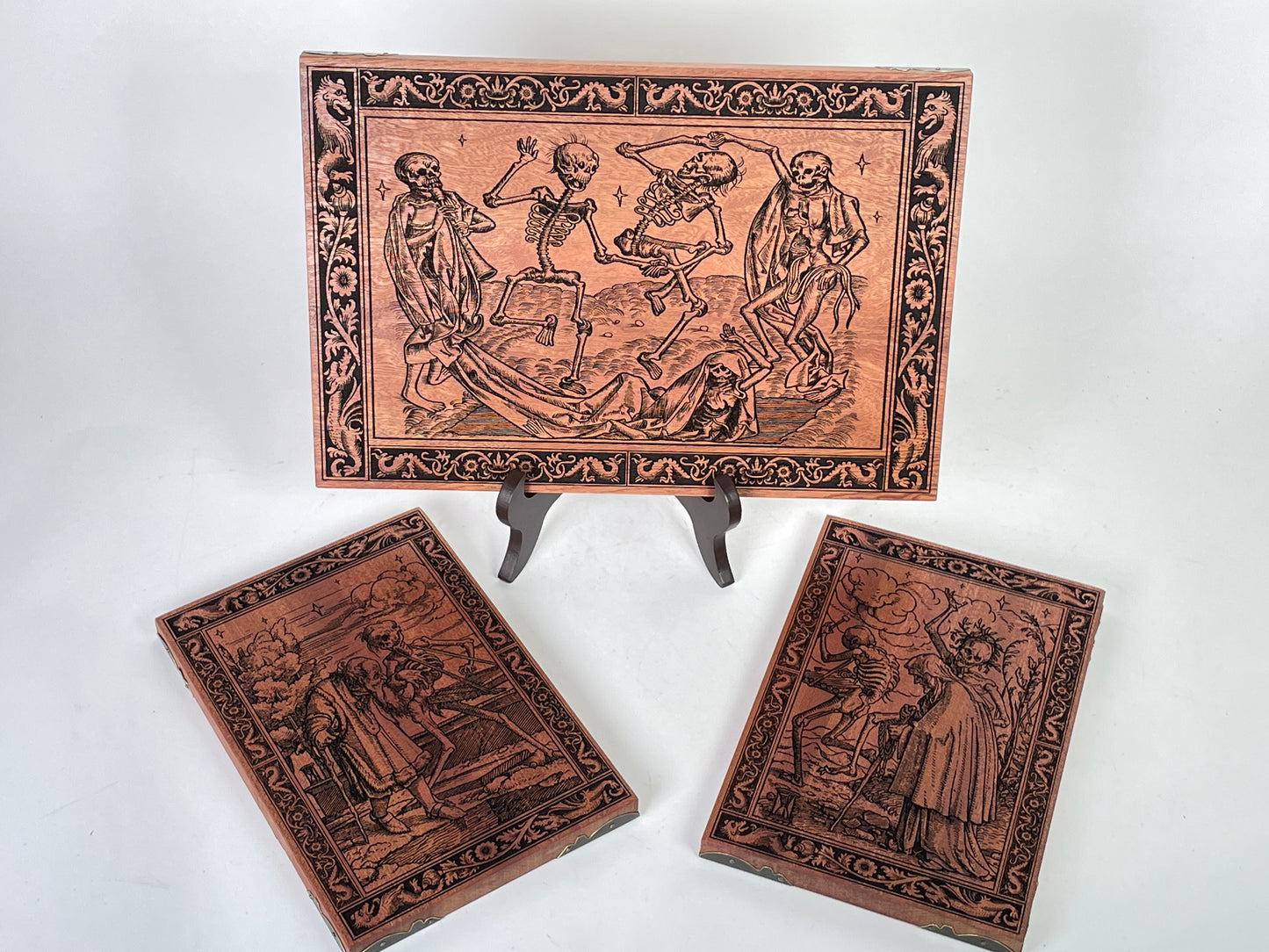Solid engraved mahogany wood wall decor showing medieval memento mori imagery
