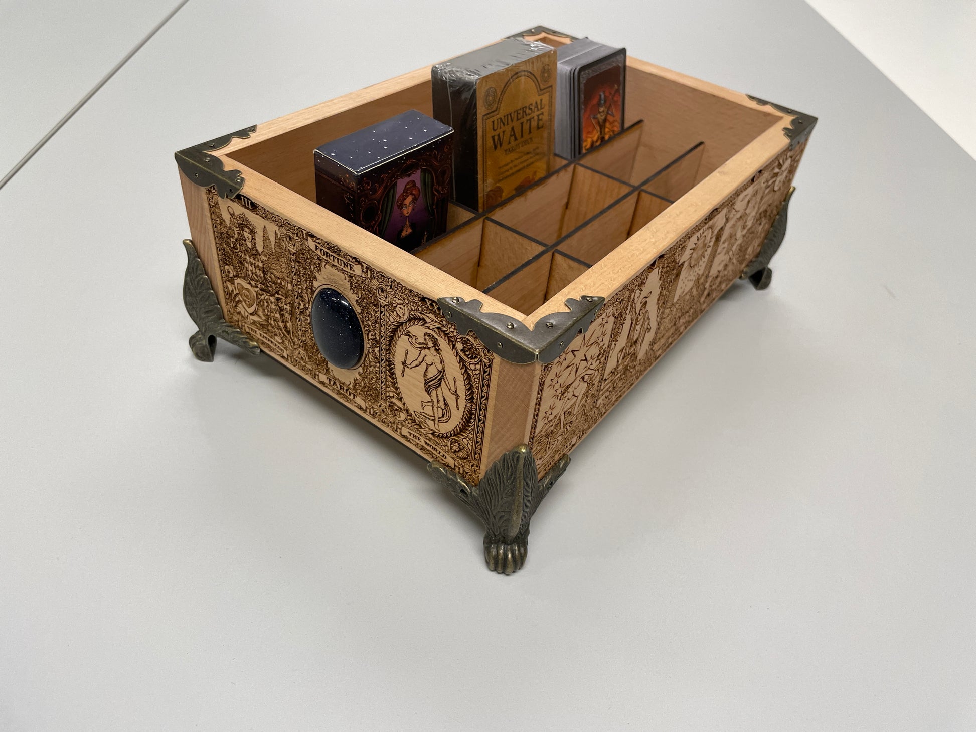 Solid wood tarot and oracle deck keeper with engraved tarot cards and celestial symbols for sacred storage

