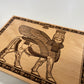 Anunnaki Lamassu Wall Art – Ancient mythology Assyrian Winged Guardian Engraved Wooden Panel - Forgotten Engravings