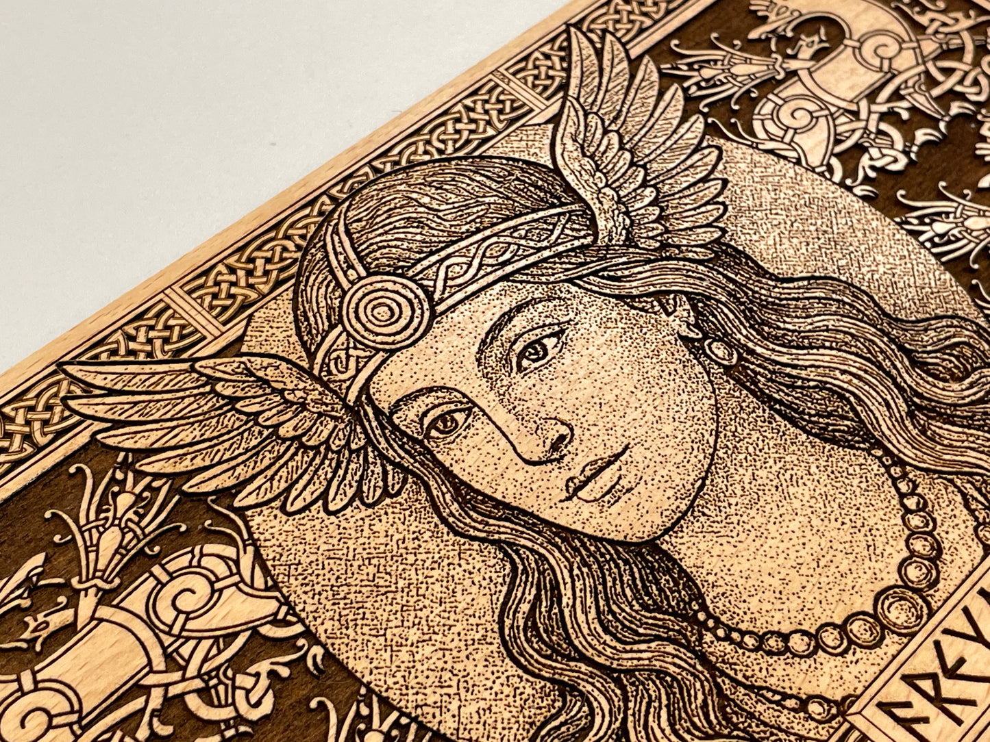 Detailed illustration of Freya with intricate patterns on a textured background