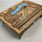 Side view of Egyptian altar box showing engraved cobras and turquoise stone, Eye of Horus tarot card storage chest