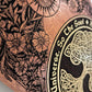 Close up of Tree of Life engraving with As Above So Below text on mahogany Wiccan ritual altar table

