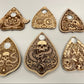 engraved wooden ouija planchettes set with skull serpent and occult symbols collection