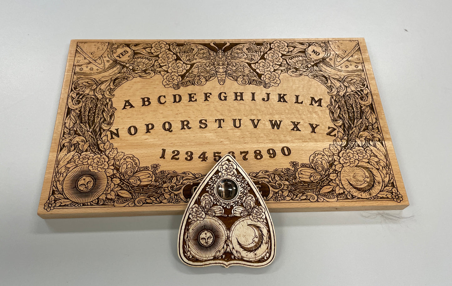 Ouija board game with flowers and butterflies, floral and cosmic spirit board with wiccan elements - Forgotten Engravings