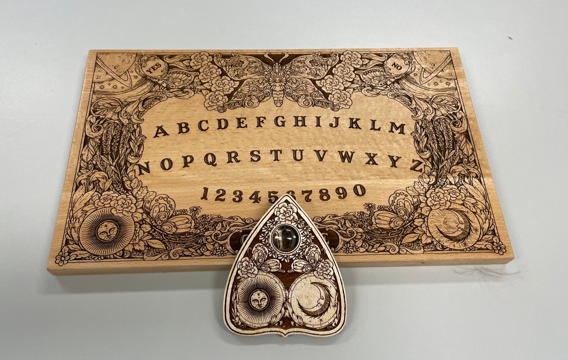 Ouija board game with flowers and butterflies, floral and cosmic spirit board with wiccan elements - Forgotten Engravings