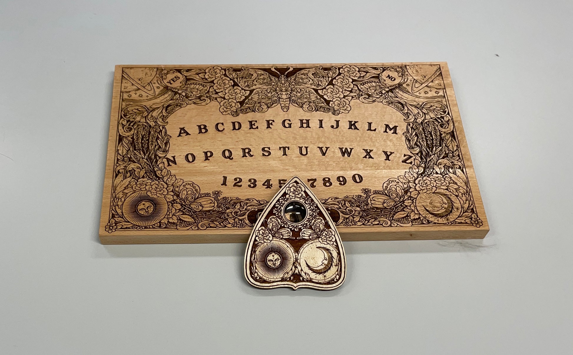 Ouija board game with flowers and butterflies, floral and cosmic spirit board with wiccan elements - Forgotten Engravings