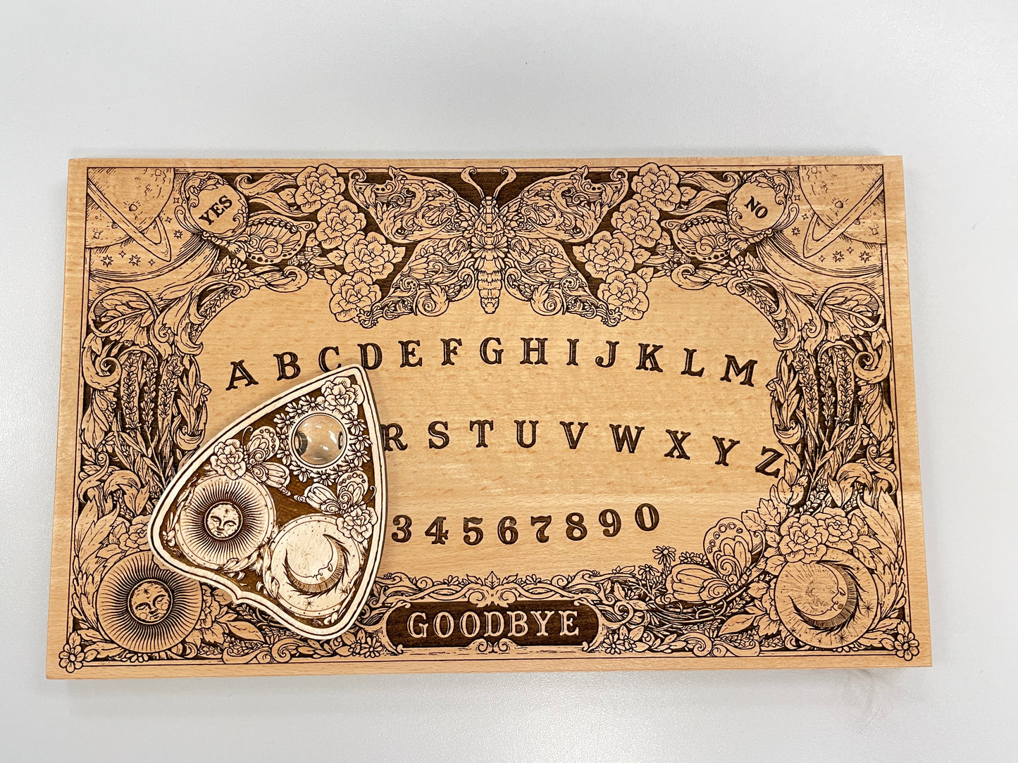 Ouija board game with flowers and butterflies, floral and cosmic spirit board with wiccan elements - Forgotten Engravings