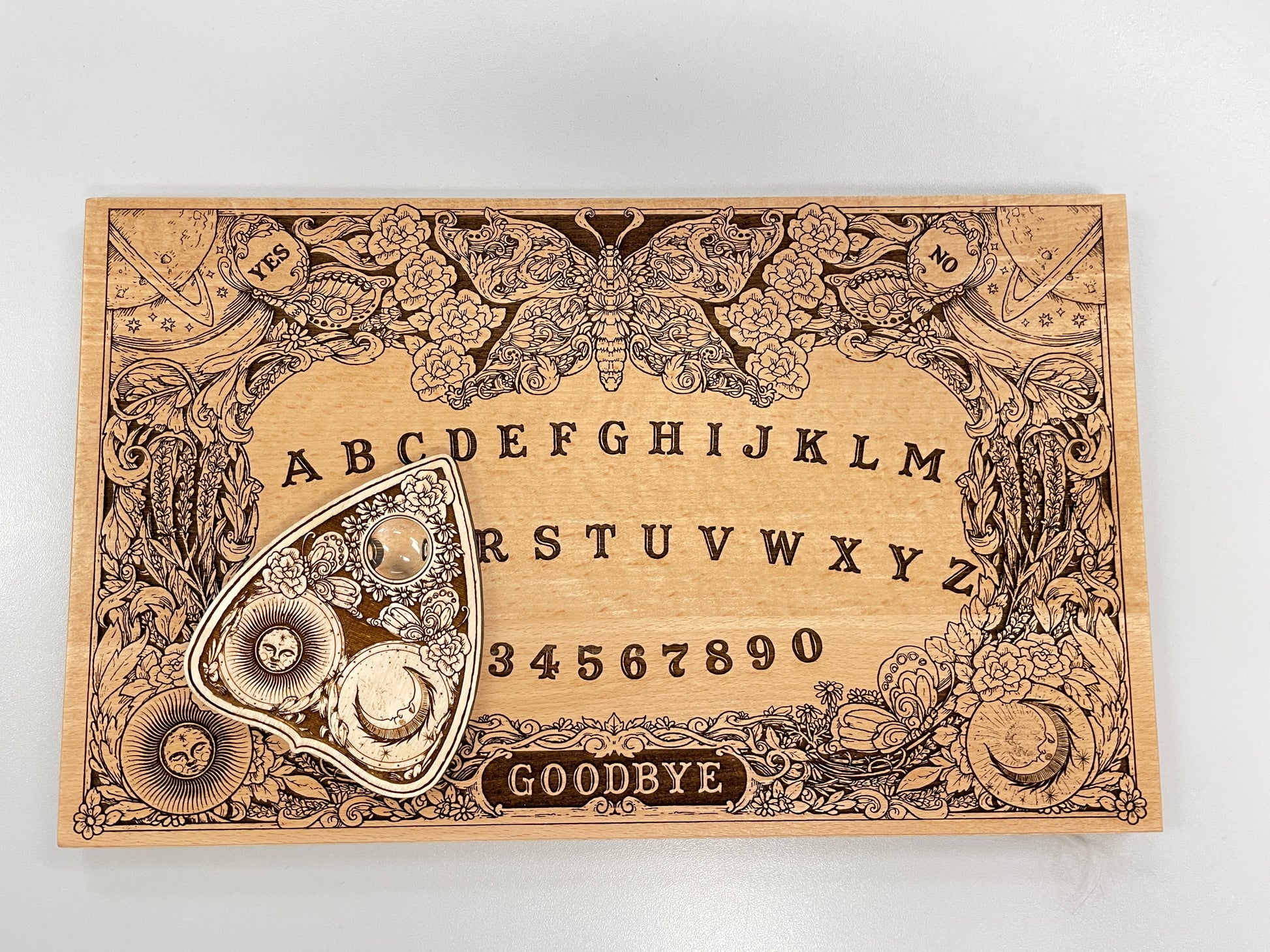 Ouija board game with flowers and butterflies, floral and cosmic spirit board with wiccan elements - Forgotten Engravings