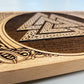 detail view of Valknut Nordic altar table with Yggdrasil coins engraved in wood