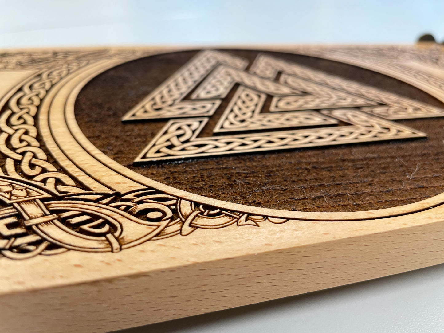 detail view of Valknut Nordic altar table with Yggdrasil coins engraved in wood