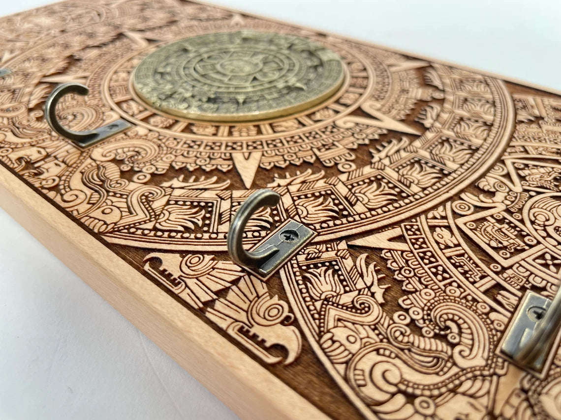 Mayan calendar engraved wooden wall art key holder with Aztec sun calendar design
