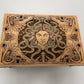 Wooden box with Medusa design on a white background