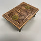 Side view of engraved Norse pagan wooden keepsake box showing wood grain
