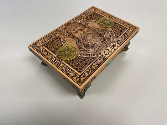 Side view of engraved Norse pagan wooden keepsake box showing wood grain
