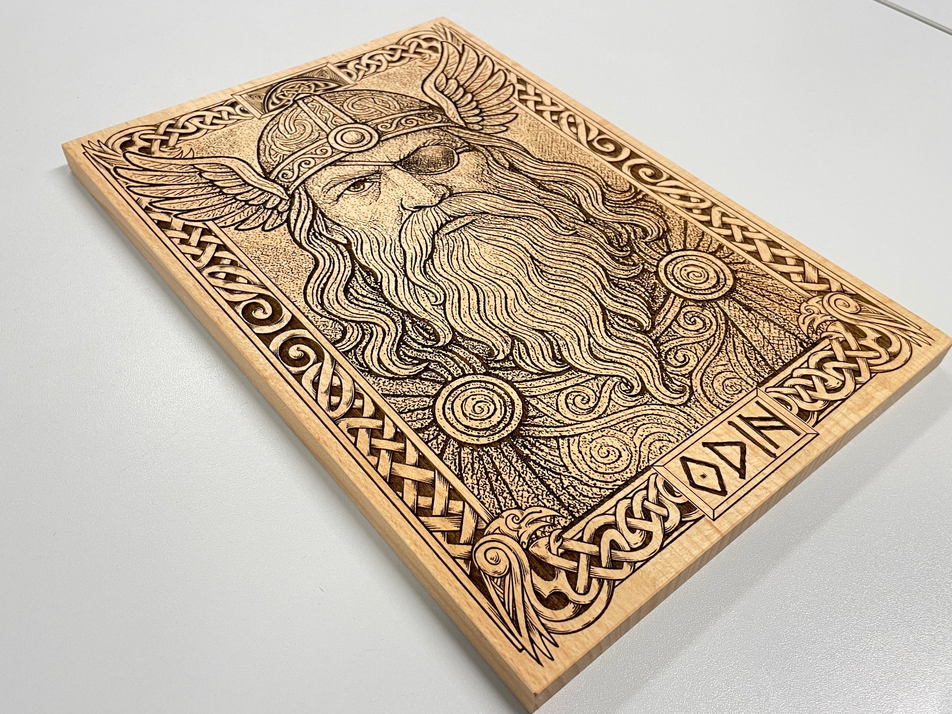 Deep engraved Odin Allfather wall art for pagan altar and mythological interior design
