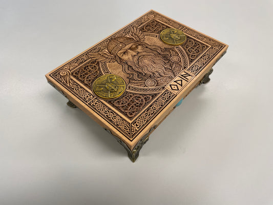 Side view of engraved Norse wooden keepsake box showing wood grain
