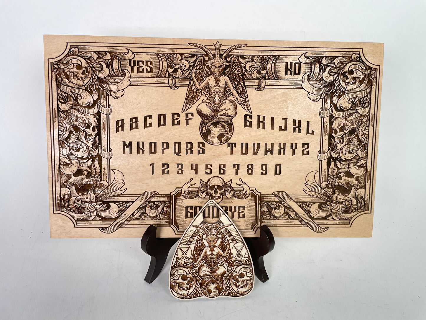 Baphomet Ouija board engraved on wood with gothic occult symbolism
