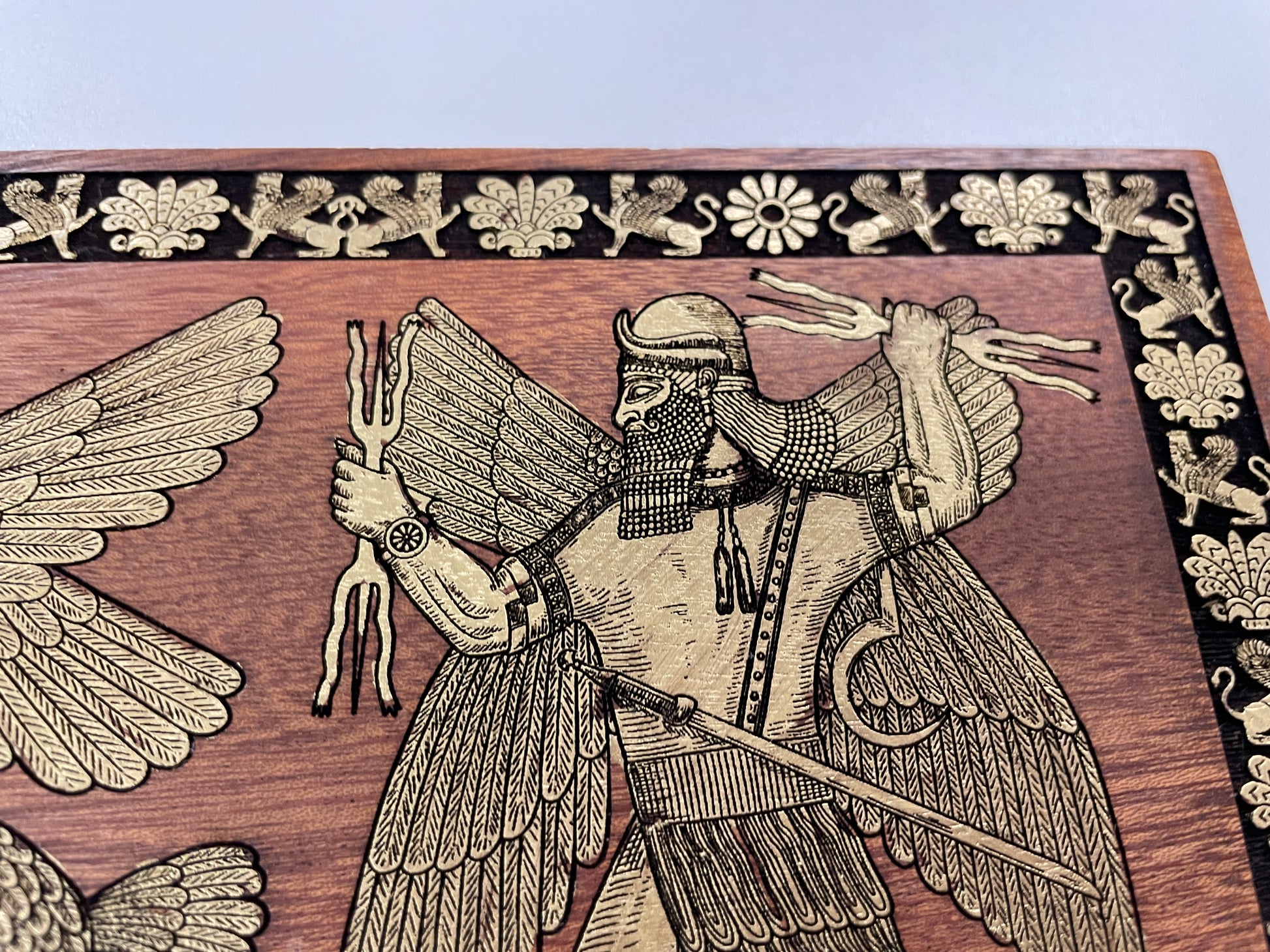 Engraved solid wood Assyrian goddess and Anunnaki symbol wall art for history enthusiasts