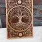 Sacred geometry and Wiccan spiritual wall art engraved on hand-painted wood for meditation space