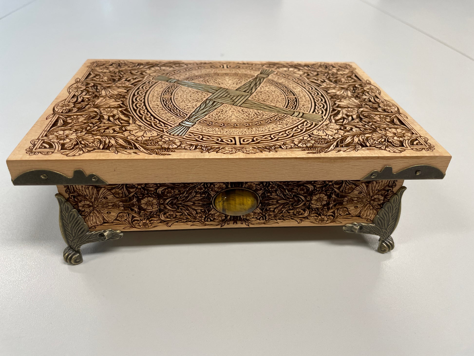 Handmade St. Brigid altar box with brass feet and velvet interior for spiritual storage