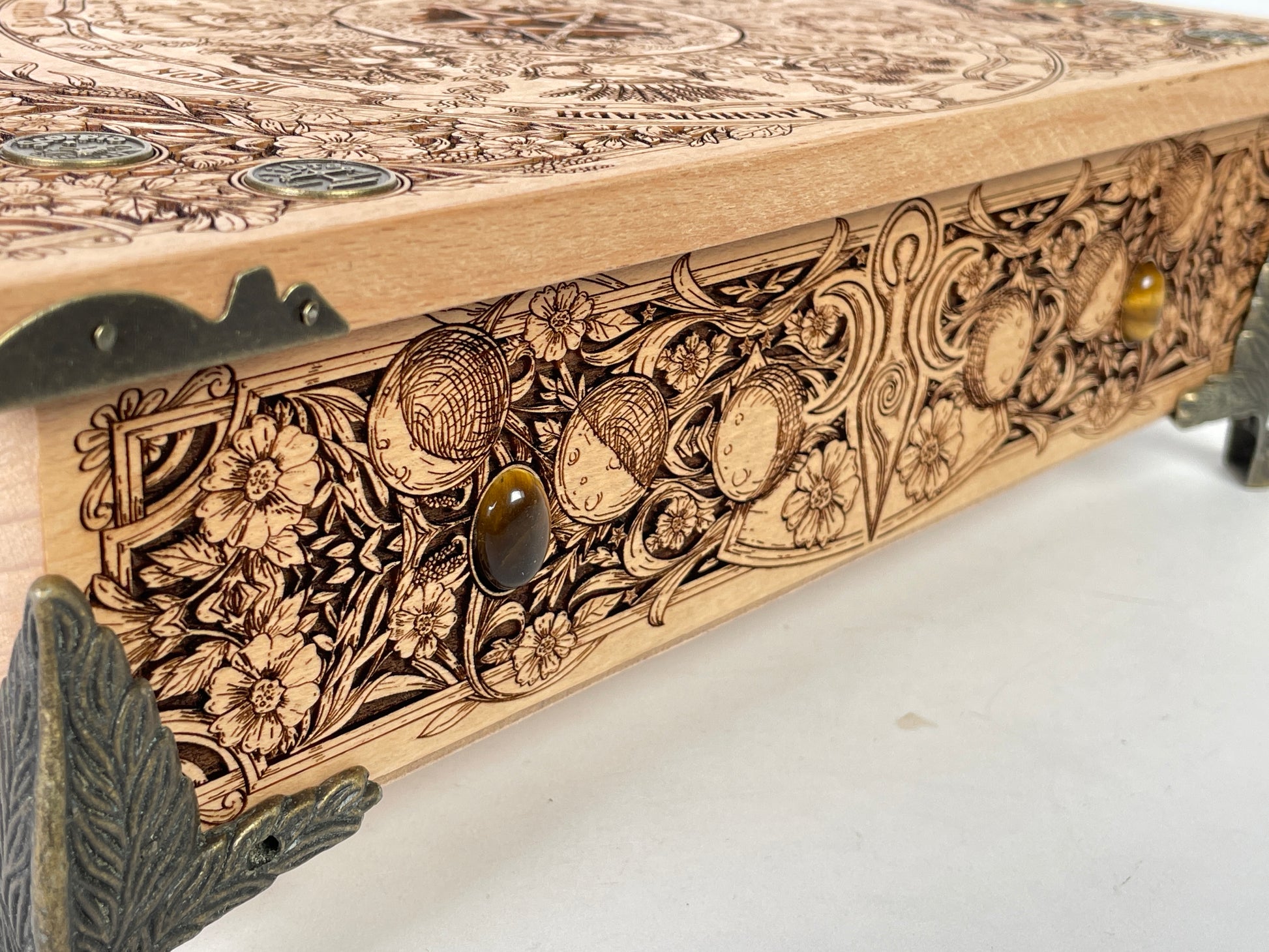 Wheel of the Year sabbat engraving on wooden altar tarot holder
