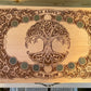 Close up of Yggdrasil Tree of Life engraving on large wooden tarot storage box
