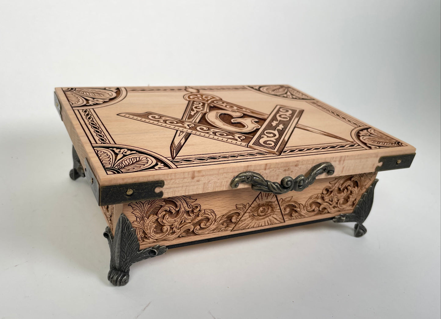 Handmade engraved Freemason tarot and oracle deck chest displayed with sacred tools
